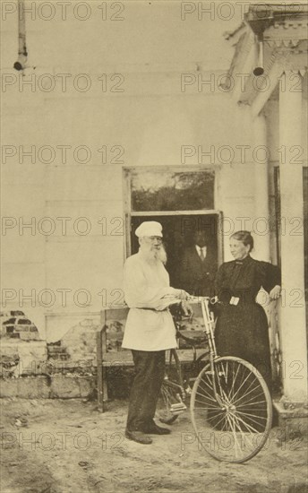 Russian author Leo Tolstoy with a bicycle, Russia, 1890s. Artist: Sophia Tolstaya