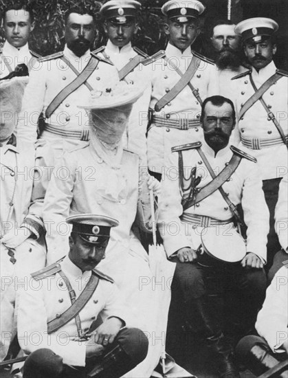 Tsar Nicholas II and Tsarina Alexandra Fyodorovna of Russia with a group of army officers, c1904. Artist: Unknown