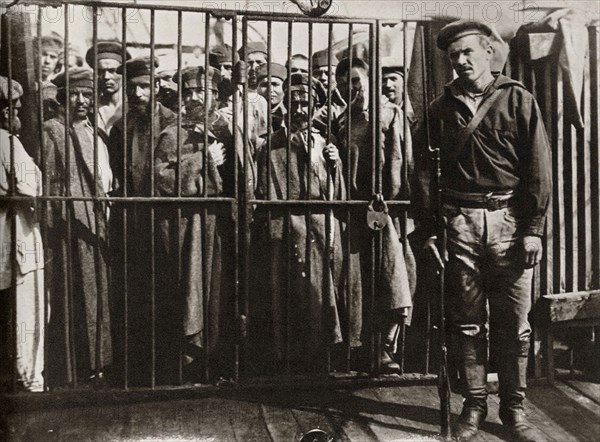 Caged prisoners cage on the steamer 'Petersburg' on the way to Sakhalin, Russia, 1890. Artist: Anton Chekhov