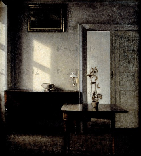 Interior with potted plant on card table, 1910-1911. Artist: Hammershøi, Vilhelm (1864-1916)