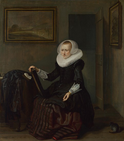 A Woman holding a Mirror, 1625. Artist: Codde, Pieter (1599-1678)