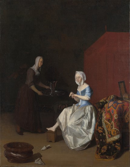 A Young Lady trimming her Fingernails, attended by a Maidservant, c. 1670. Artist: Ochtervelt, Jacob Lucasz. (1634-1682)