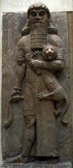 Hero Gilgamesh mastering a lion, 722-705 BC. Artist: Assyrian Art