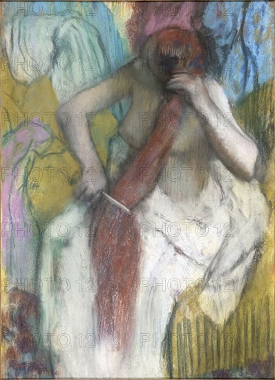 Woman Combing Her Hair. Artist: Degas, Edgar (1834-1917)