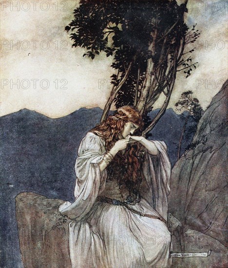 Brünnhilde kisses the ring that Siegfried has left with her. Illustration for Siegfried and The Twi Artist: Rackham, Arthur (1867-1939)