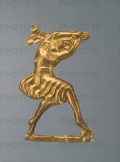 Gold plaque in the form of a dancing woman, 330-300 BC. Artist: Ancient jewelry