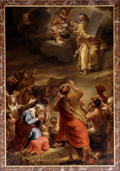 Moses descends from Mount Siniai with the Ten Commandments.