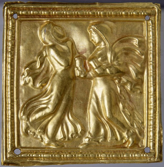 Square plaque with dancers.