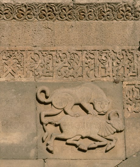 Lion attacking bull. Portal of the Ulu Camii (Great Mosque) of Diyarbakir.
