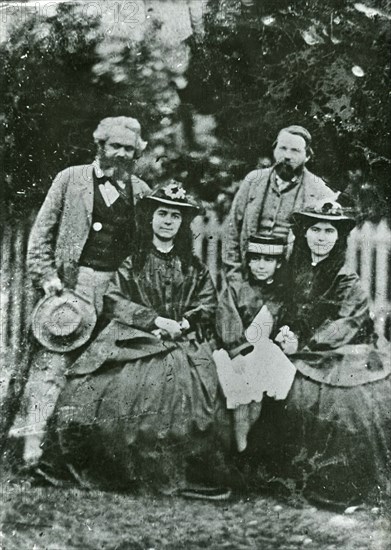Karl Marx, Friedrich Engels and the daughters Jenny, Eleanor and Laura Marx, 1864.