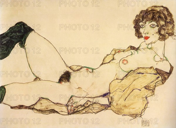 Lying nude with green stockings, 1917.
