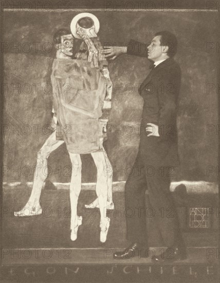 Egon Schiele by the sketch of an unfinished fresco, 1914.