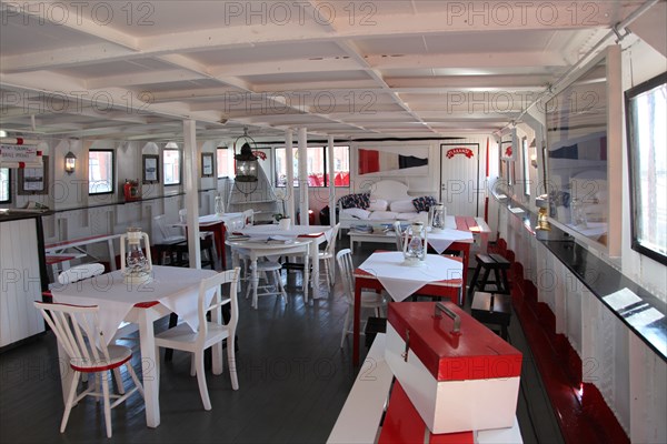 Dining room on board the lightship 'Relandersgrund', Helsinki, Finland, 2011. Artist: Sheldon Marshall