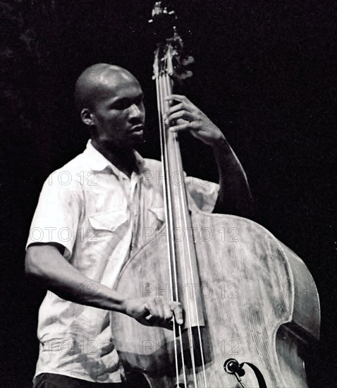 Michael Olatuja, Brecon Jazz Festival, Powys, Wales, 2003. Artist: Brian O'Connor