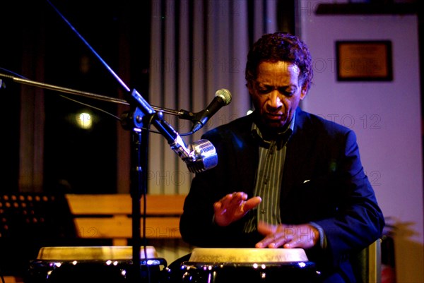 Frank Holder, Guyanan jazz singer and percussionist, Jazz Hastings, Hastings, East Sussex.  Artist: Brian O'Connor