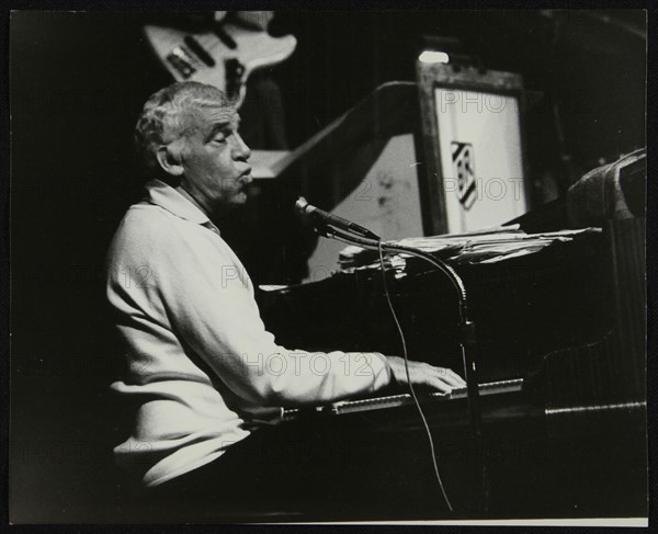 Buddy Rich playing the piano, Forum Theatre, Hatfield, Hertfordshire, November 1986. Artist: Denis Williams