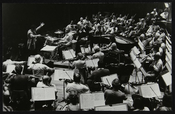 Buddy Rich and the Royal Philharmonic Orchestra in concert at the Royal Festival Hall, London, 1985. Artist: Denis Williams