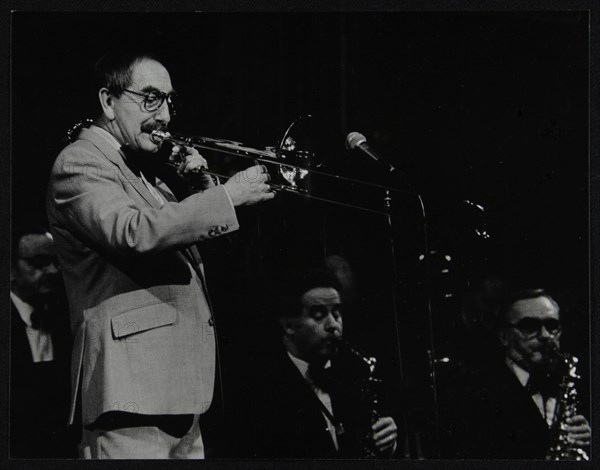 Trombonist Don Lusher playing with the Ted Heath Orchestra. Artist: Denis Williams