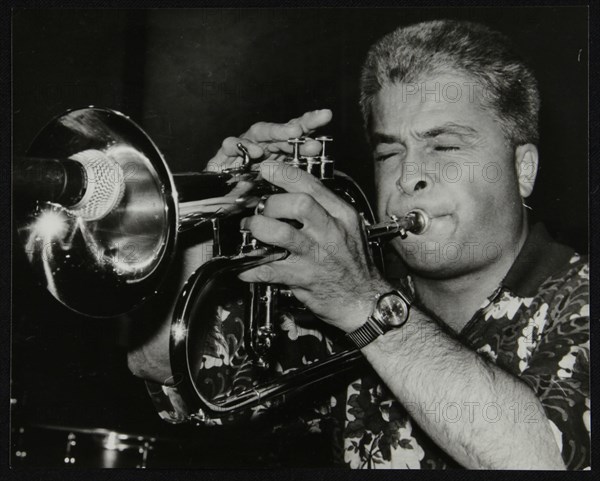 Nick Hill playing the flugelhorn at The Fairway, Welwyn Garden City, Hertfordshire, 1991. Artist: Denis Williams