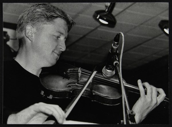 Christian Garrick playing the violin at The Fairway, Welwyn Garden City, Hertfordshire, 2000. Artist: Denis Williams