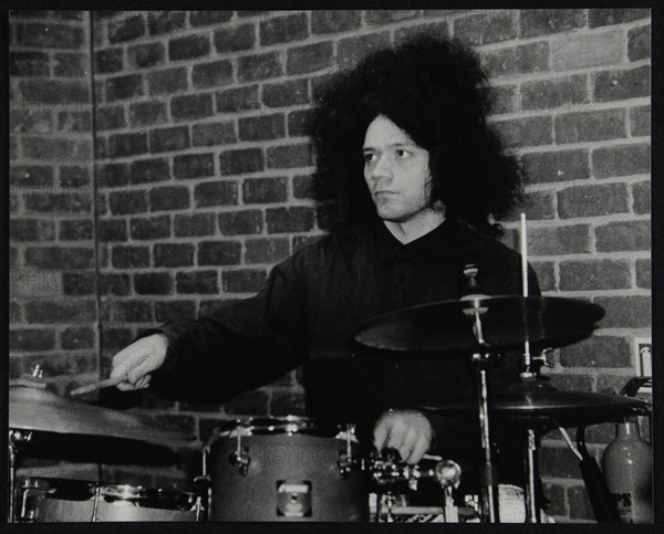 Drummer Seb Rochford playing at The Fairway, Welwyn Garden City, Hertfordshire, 8 April 2001. Artist: Denis Williams