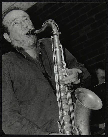 Renato D'Aiello playing tenor saxophone at The Fairway, Welwyn Garden City, Hertfordshire, 2004. Artist: Denis Williams