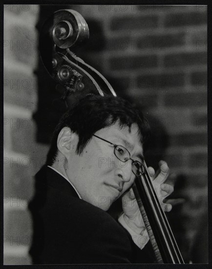 Japanese bassist Kengo Nakamura playing at The Fairway, Welwyn Garden City, Hertfordshire, 2004. Artist: Denis Williams