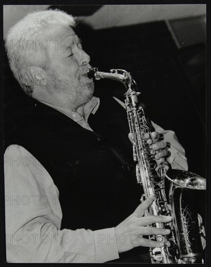 Geoff Simkins playing alto saxophone at The Fairway, Welwyn Garden City, Hertfordshire, 2002. Artist: Denis Williams