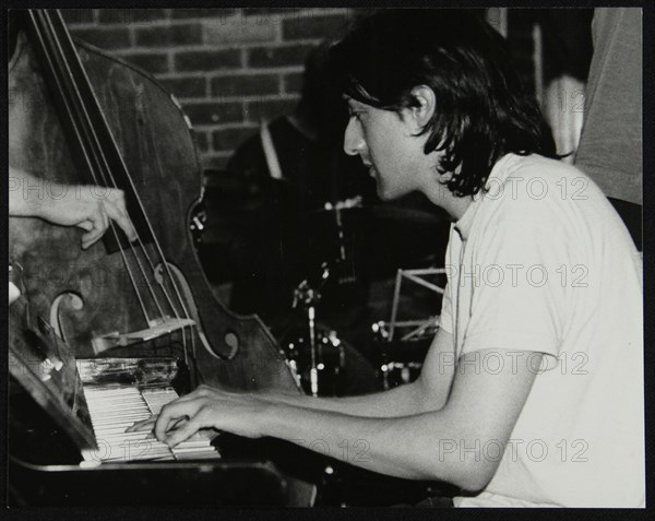 Pianist Leon Greening playing at The Fairway, Welwyn Garden City, Hertfordshire, 8 June 2003. Artist: Denis Williams