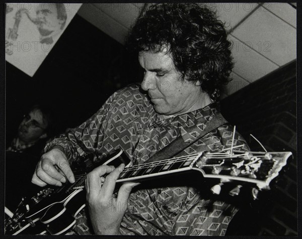 Guitarist John Etheridge playing at The Fairway, Welwyn Garden City, Hertfordshire, 9 November 2003. Artist: Denis Williams