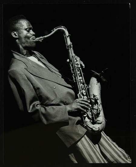 Steve Williamson playing tenor saxophone at the Forum Theatre, Hatfield, Hertfordshire, 1990. Artist: Denis Williams