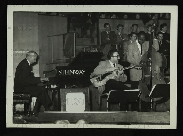 The Stan Kenton Orchestra in concert, 1956. Artist: Denis Williams