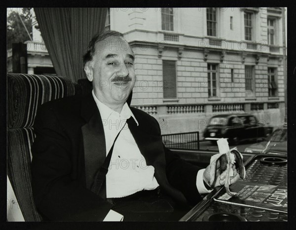 Guitarist Chuck Christiansen travelling by coach to the Royal Albert Hall, London, 28 May 1992. Artist: Denis Williams