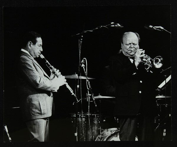 Peanuts Hucko and Billy Butterfield playing at Potters Bar, Hertfordshire, 1986. Artist: Denis Williams