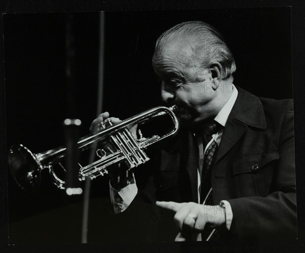 Trumpeter Kenny Baker playing at the Forum Theatre, Hatfield, Hertfordshire, 1978. Artist: Denis Williams