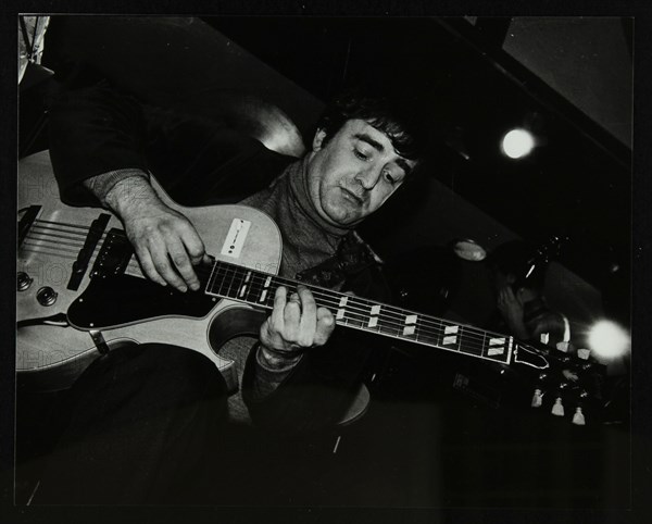 Esmond Selwyn playing the guitar at The Bell, Codicote, Hertfordshire, 22 February 1981. Artist: Denis Williams