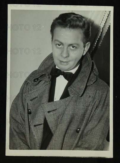 Portrait of American singer, musician and actor Mel Torme, c1950s. Artist: Denis Williams