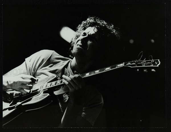 Guitarist John Etheridge playing at The Stables, Wavendon, Buckinghamshire. Artist: Denis Williams