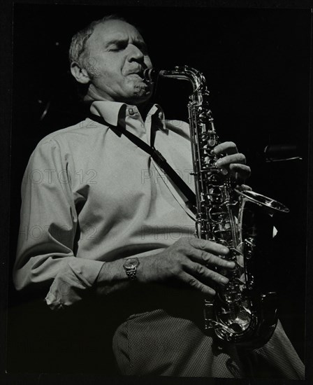 Saxophonist Bruce Turner playing at The Stables, Wavendon, Buckinghamshire. Artist: Denis Williams