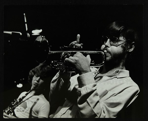 Chris Hunter (saxophone) and Guy Barker (trumpet) playing at The Stables, Wavendon, Buckinghamshire. Artist: Denis Williams