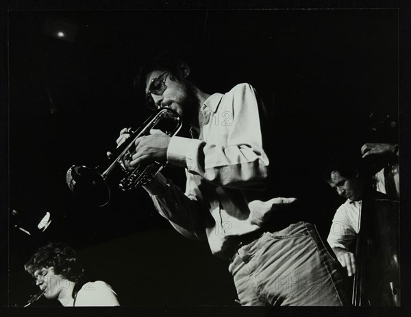 Guy Barker, Chris Hunter and Chris Laurence playing at The Stables, Wavendon, Buckinghamshire. Artist: Denis Williams