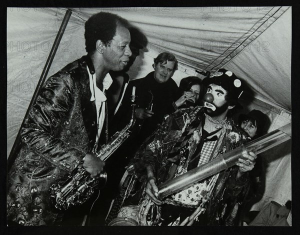 American saxophonist Ornette Coleman meets a clown, Bracknell Jazz Festival, Berkshire, 1978. Artist: Denis Williams