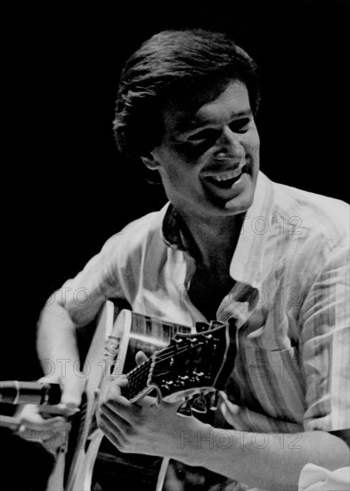 John McLaughlin, jazz guitarist, bandleader and composer, London , 1976. Artist: Brian O'Connor.