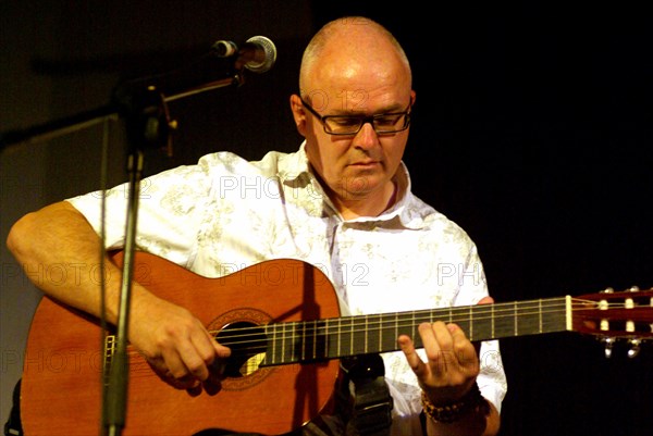 Kevin Armstrong, guitarist, producer, songwriter, and composer, Brecon, 2009. Artist: Brian O'Connor.
