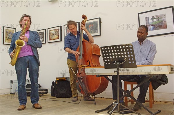 Basil Hodge, Ed Jones and Riaan Vosloo, Clock Tower Cafe, Croydon, London, 2015. Artist: Brian O'Connor.