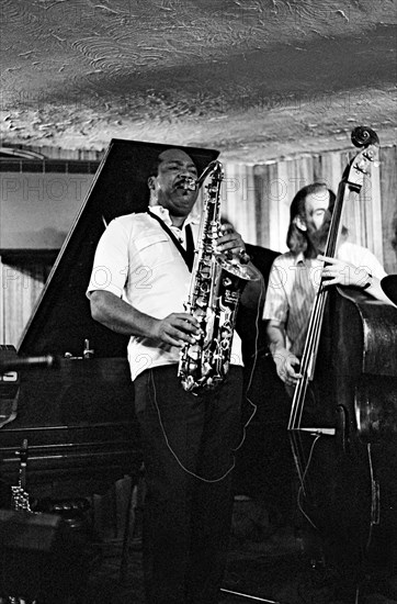 Nathan Davis and P Ind, Bass Clef, Hoxton Square, London, Aug 1987. Artist: Brian O'Connor.