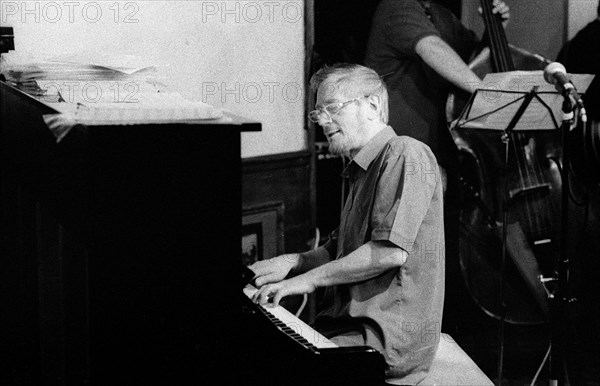 Michael Garrick, Watermill Jazz Club, Dorking, Surrey, May, 2001. Artist: Brian O'Connor.