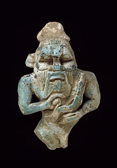 Faience amulet of Bes nursing a Horus, XXVth Dynasty (c770 BC-c715 BC). Artist: Unknown.