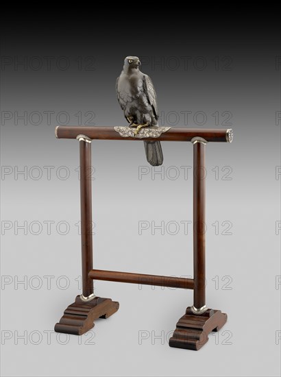 Figurine of hawk on a perch, c1890. Artists: Unknown, Jomi Eisuke.