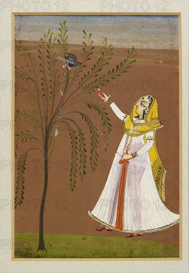 Lady feeding a bird in a tree, 19th century. Artist: Unknown.